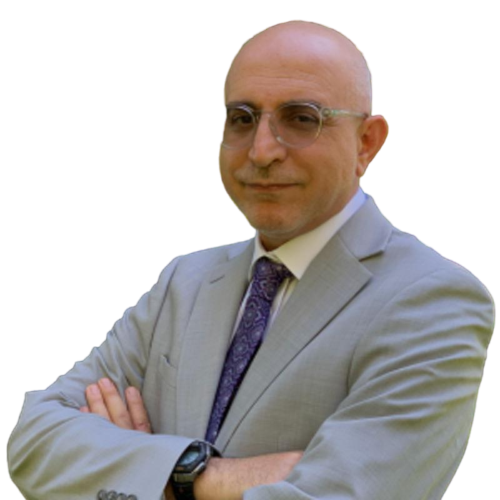 Dr. Mohammad Ali Faghihi in a light gray suit
