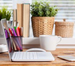 work-space-laptop-blank-screen-on-wooden-table-2022-07-07-15-17-41-utc.jpg